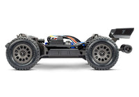 [Boyut] Traxxas Mini XRT VXL-3s - kasasız şasi yandan tam görünüm Gravix lastikler ile