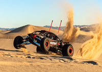 [Action] Traxxas Funco Sand Car - kırmızı siyah model kumda viraj alıyor