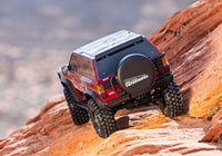 [Action] Traxxas TRX-4 Pathfinder - kırmızı araç kırmızı kaya yamacını tırmanıyor arkadan görünüm