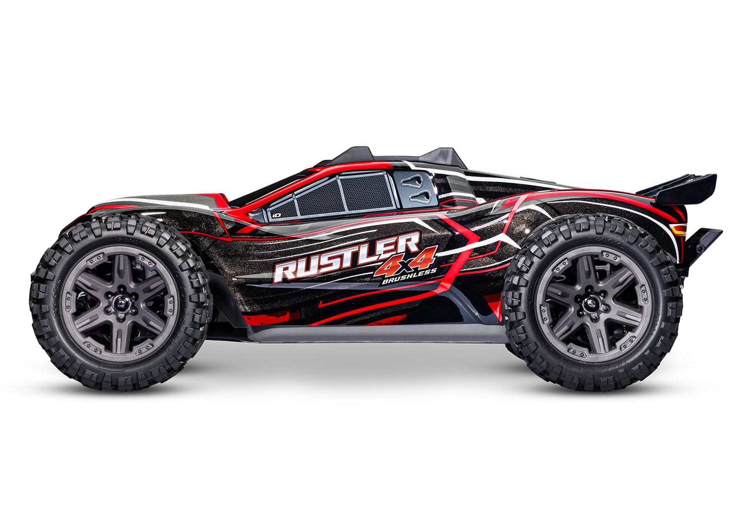 [Dış] Traxxas Rustler Combo - kırmızı kaportalı stüdyo çekimi, yan profil