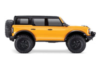 [Dış] Traxxas Bronco Combo - turuncu RC araç stüdyo yandan görünüm