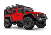 [Dış] Traxxas TRX-4M Defender - ön çeyrek açı, kırmızı gövde stüdyo çekimi
