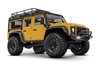 [Dış] Traxxas TRX-4M Defender - ön çeyrek açı, sarı gövde stüdyo çekimi