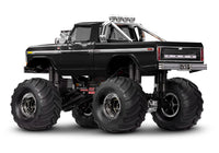 [Dış] Traxxas TRX-4MT F-150 - Siyah Ford F-150 Monster Truck 1/18 ölçek stüdyo arkadan 3/4 görünüm