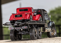 [Action] Traxxas TRX-6 Hauler - açık havada 3/4 arkadan, kırmızı hot rod yüklü