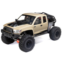 [Dış] Axial SCX6 Trail Honcho - kum rengi araç stüdyo çekimi, ön çapraz görünüm